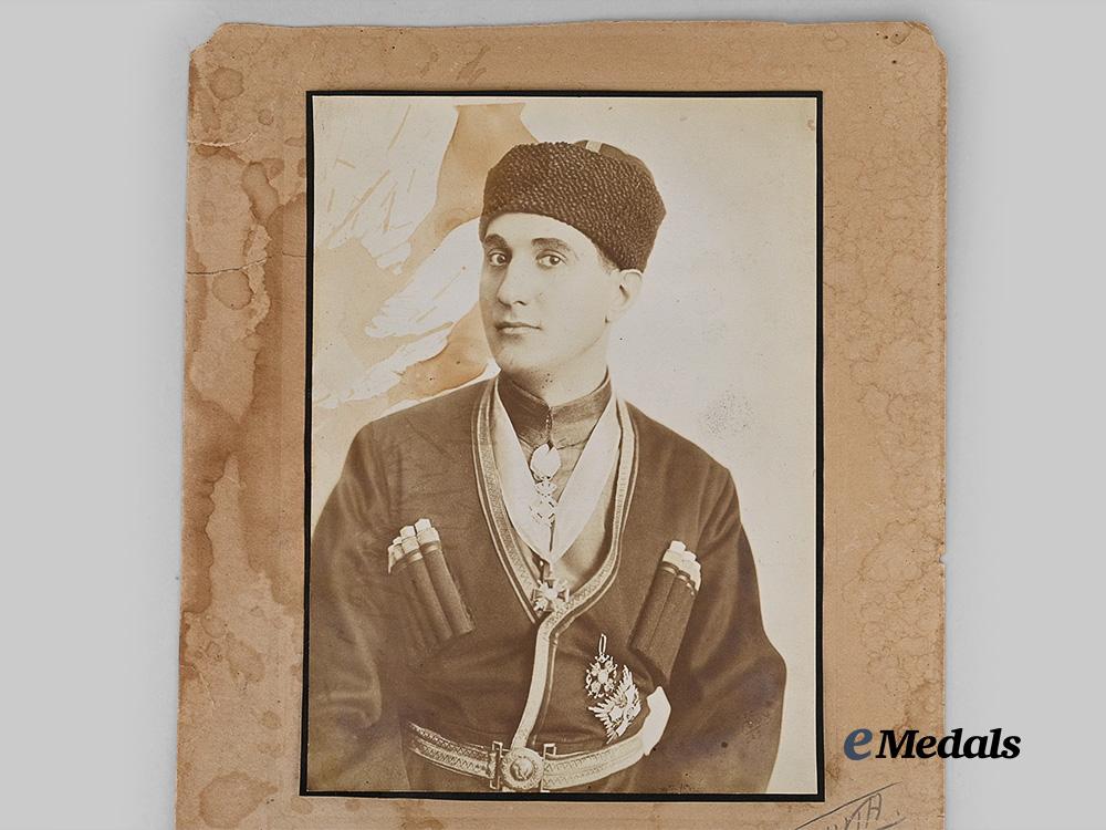russia,_imperial._a_large_cossack_studio_portrait_with_orders_e_medals__e_u24795_4