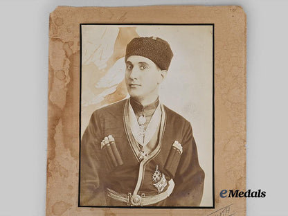 russia,_imperial._a_large_cossack_studio_portrait_with_orders_e_medals__e_u24795_4