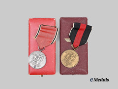 Germany, Third Reich. A Pair of Occupation Medals, with Cases