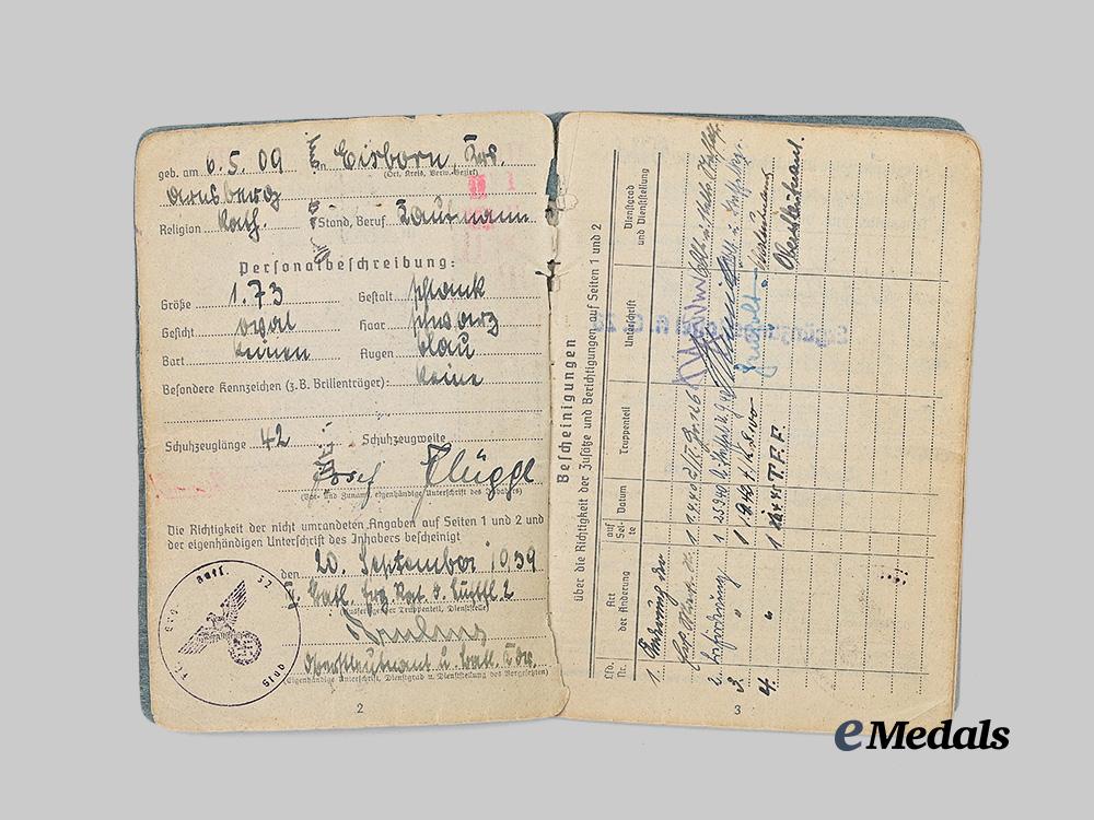 germany,_luftwaffe._a_soldbuch_to_josef_flügge,_honour_goblet_and_german_cross_in_gold_recipient_e_medals__g60038_2