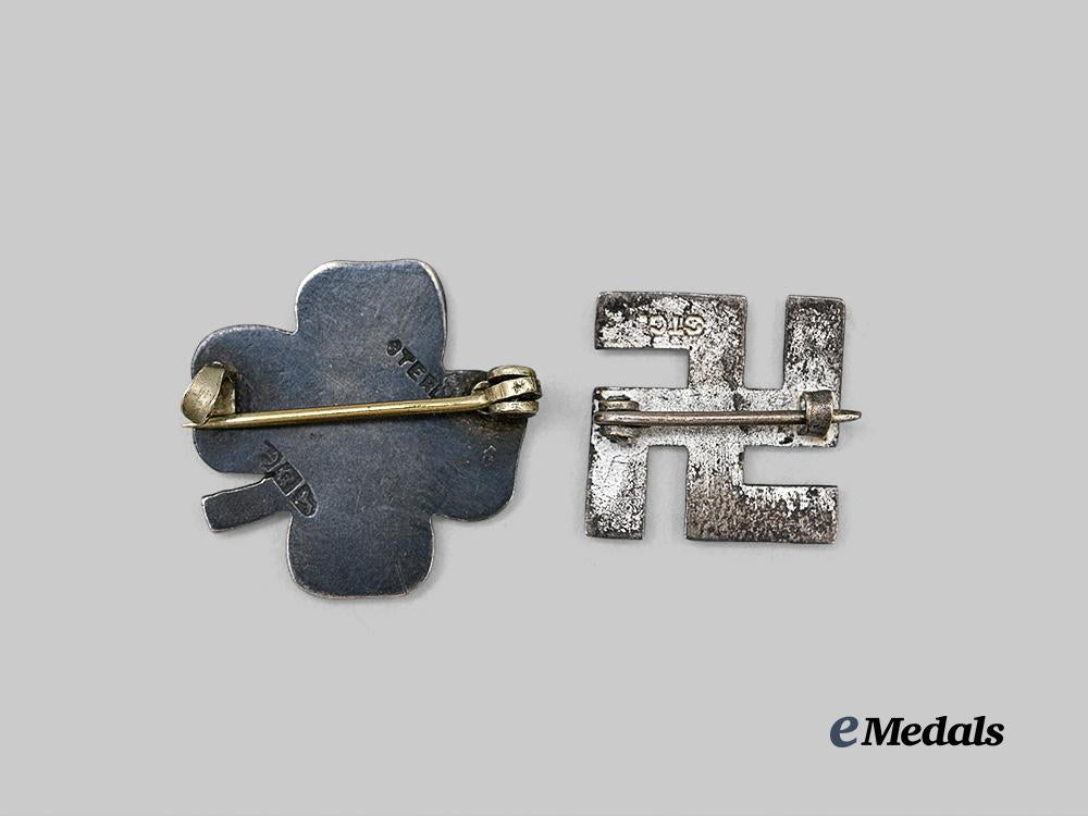germany,_third_reich._a_pair_of_patriotic_swastika_badges_in_silver,_british_export_examples_e_medals__g60927_3