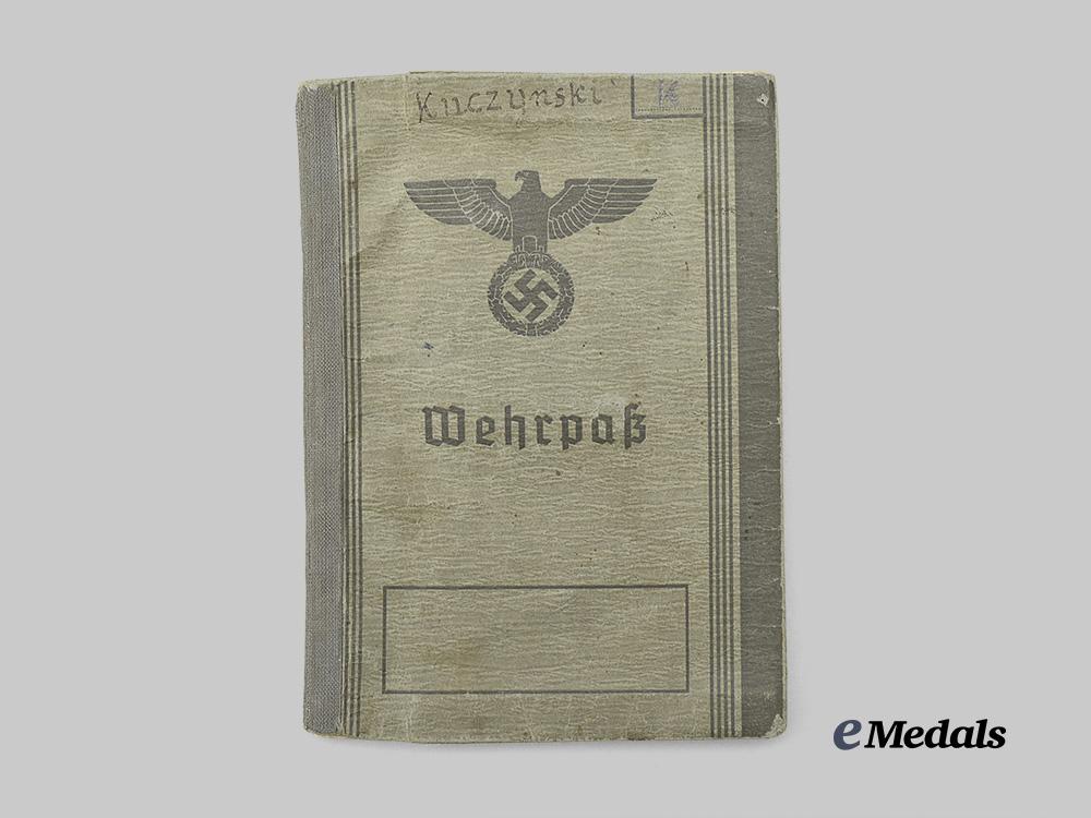 germany,_heer._a_wehrpaß_to_paul_kuczynski,_channel_coast_security_e_medals__g60994_2