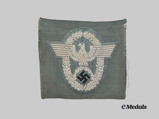 germany,_ordnungspolizei._a_schutzpolizei_enlisted_ranks_sleeve_eagle_e_medals__g61045_2