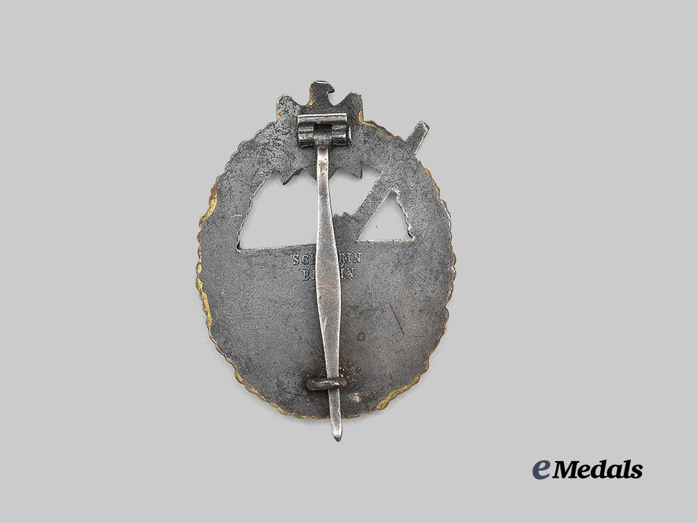 germany,_kriegsmarine._a_coastal_artillery_war_badge,_by_schwerin_e_medals__g61050_4