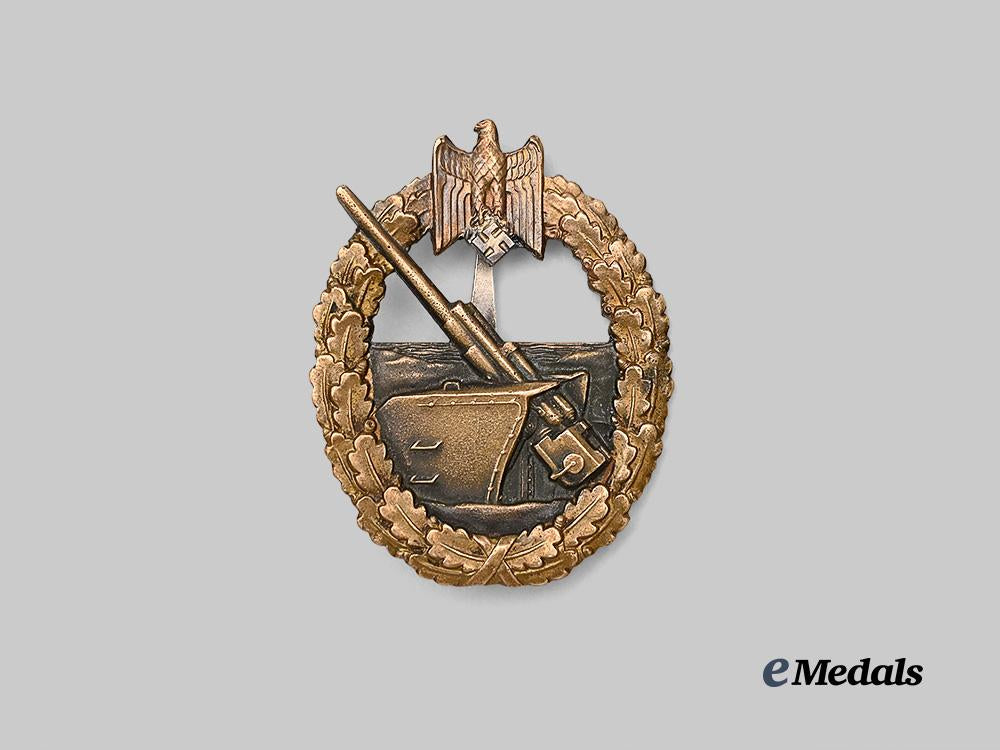 germany,_kriegsmarine._a_coastal_artillery_war_badge,_refurbished_example,_by_c._e._juncker_e_medals__g61205_2