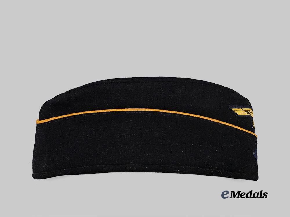 germany,_kriegsmarine._an_officer’s_dark_blue_board_cap,_late-_war_example_e_medals__g61220_2