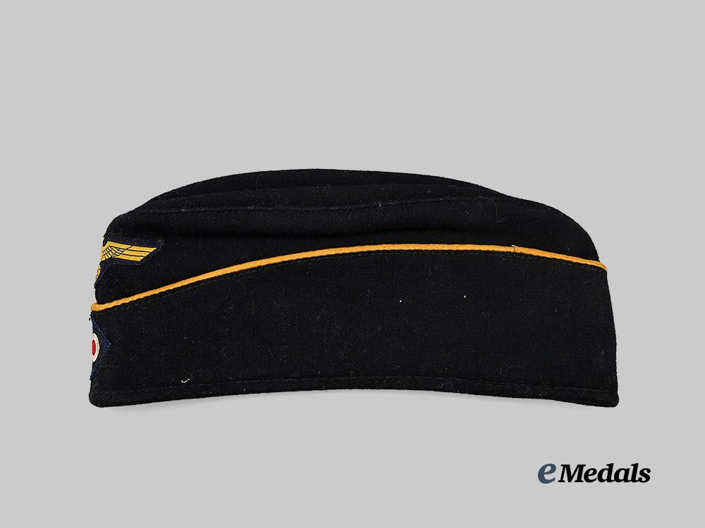 germany,_kriegsmarine._an_officer’s_dark_blue_board_cap,_late-_war_example_e_medals__g61220_3
