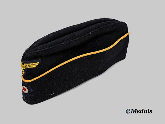 germany,_kriegsmarine._an_officer’s_dark_blue_board_cap,_late-_war_example_e_medals__g61220_6