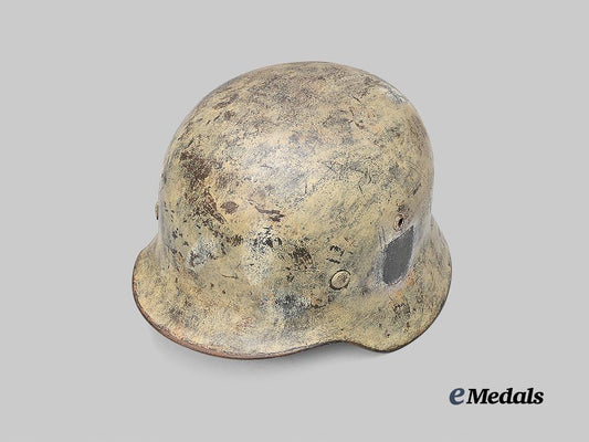 germany,_wehrmacht._an_m35_stahlhelm_with_field-_applied_winter_camouflage,_by_f._w._quist_e_medals__g61230_4