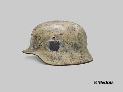 germany,_wehrmacht._an_m35_stahlhelm_with_field-_applied_winter_camouflage,_by_f._w._quist_e_medals__g61230_5