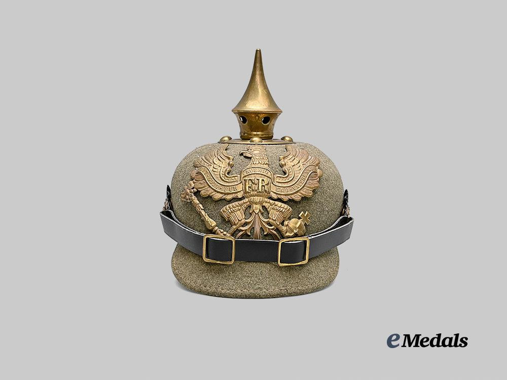 germany,_imperial._a_prussian_infantry_rolled_edge_felt_ersatz_pickelhaube_e_medals__g61244_2