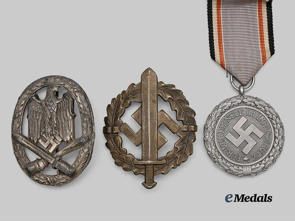 germany,_third_reich._a_mixed_lot_of_awards_for_civil_and_military_merit_e_medals__g61261_3