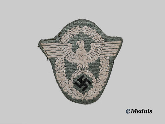 germany,_ordnungspolizei._a_schutzpolizei_sleeve_eagle_for_enlisted_ranks,_be_vo_variant_e_medals__g61272_2