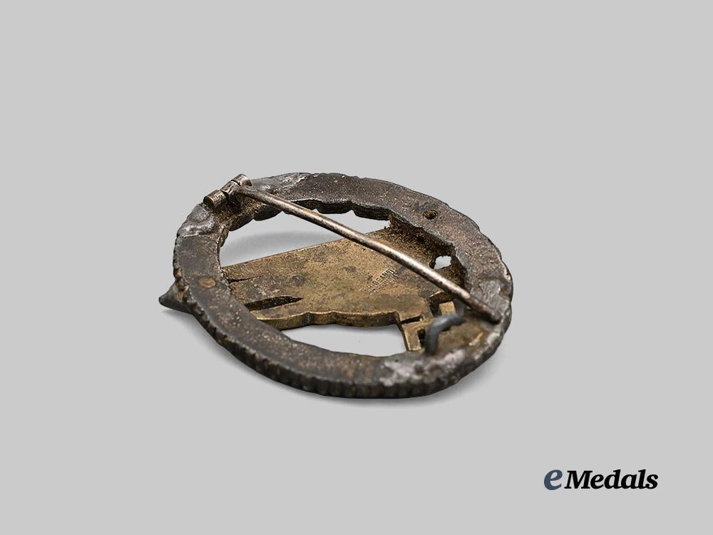 germany,_luftwaffe._a_fallschirmjäger_badge,_late-_war_field-_repaired_example,_by_g._h._osang_e_medals__g61292_4