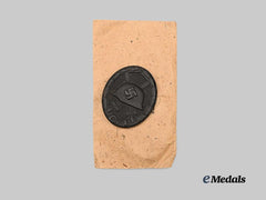 Germany, Wehrmacht. A Black Grade Wound Badge, with Package, by Friedrich Orth