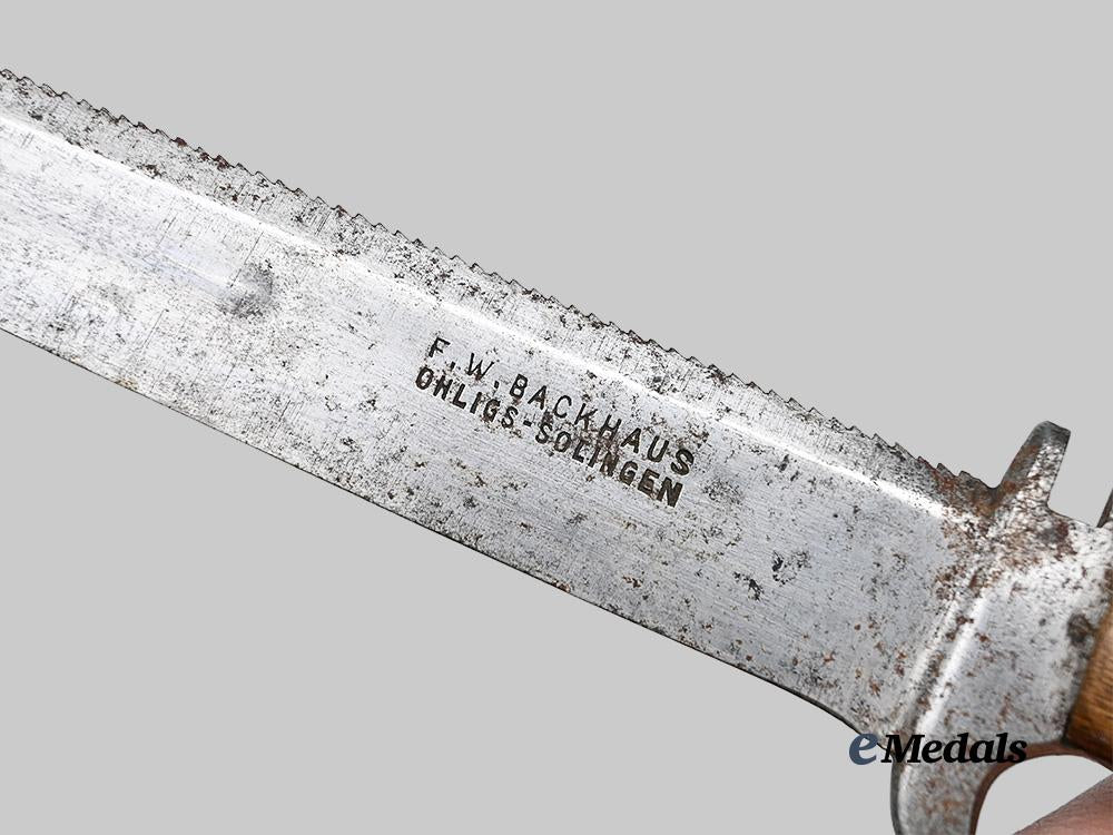 germany,_imperial._a_sawback_trench_knife,_by_f._w._backhaus_e_medals__g61390_9