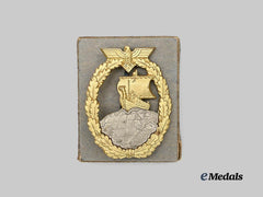 Germany, Kriegsmarine. A Mint Auxiliary Cruiser War Badge, with Case, by C.E. Juncker