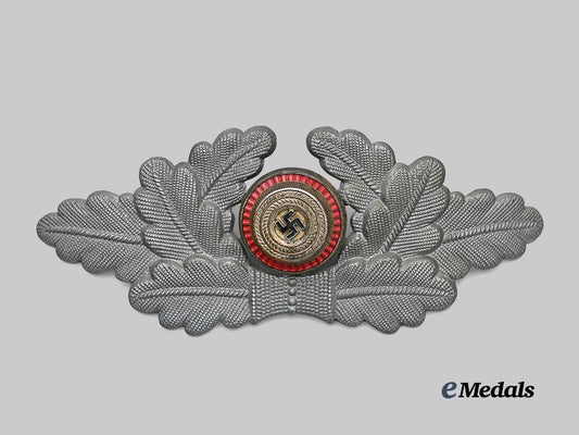 germany,_n_s_d_a_p._a_political_leader’s_visor_cap_wreath_and_cockade_e_medals__g61420_2