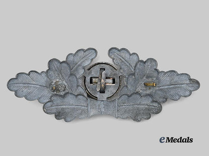 germany,_n_s_d_a_p._a_political_leader’s_visor_cap_wreath_and_cockade_e_medals__g61420_3