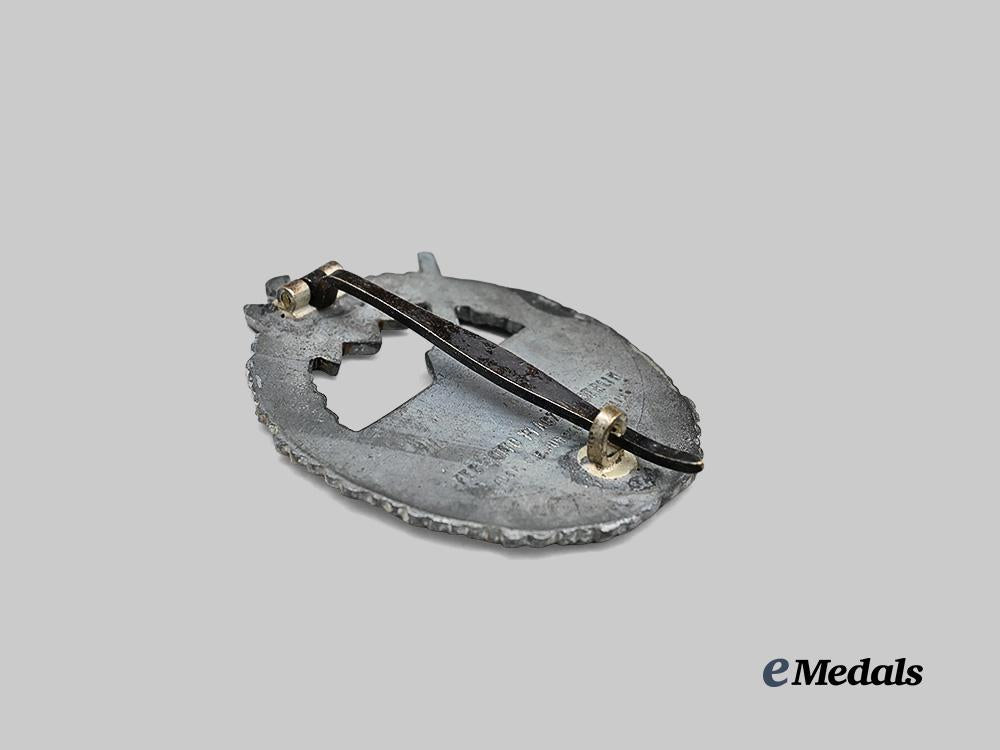 germany,_kriegsmarine._a_coastal_artillery_war_badge,_by_c._e._juncker_e_medals__g61441_4