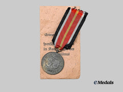 Germany, Wehrmacht. A Spanish Volunteer Medal, with Issue Package, by Deschler & Sohn