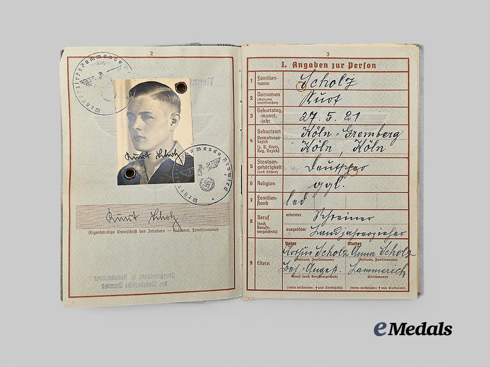 germany,_luftwaffe._a_wehrpaß_to_kurt_scholz,_k_i_a_over_france,_with_pilot’s_badge_award_document_e_medals__g61618_5