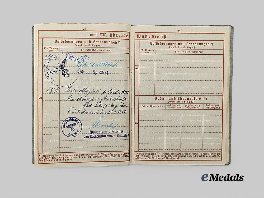 germany,_luftwaffe._a_wehrpaß_to_kurt_scholz,_k_i_a_over_france,_with_pilot’s_badge_award_document_e_medals__g61618_7