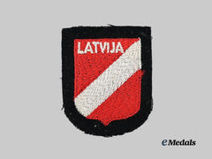 Germany, SS. A Mint Latvian Waffen-SS Volunteer’s Sleeve Insignia