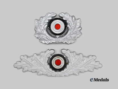 germany,_third_reich._a_pair_of_mint_cap_cockades_for_heer_and_forestry_personnel_e_medals__g61707_2