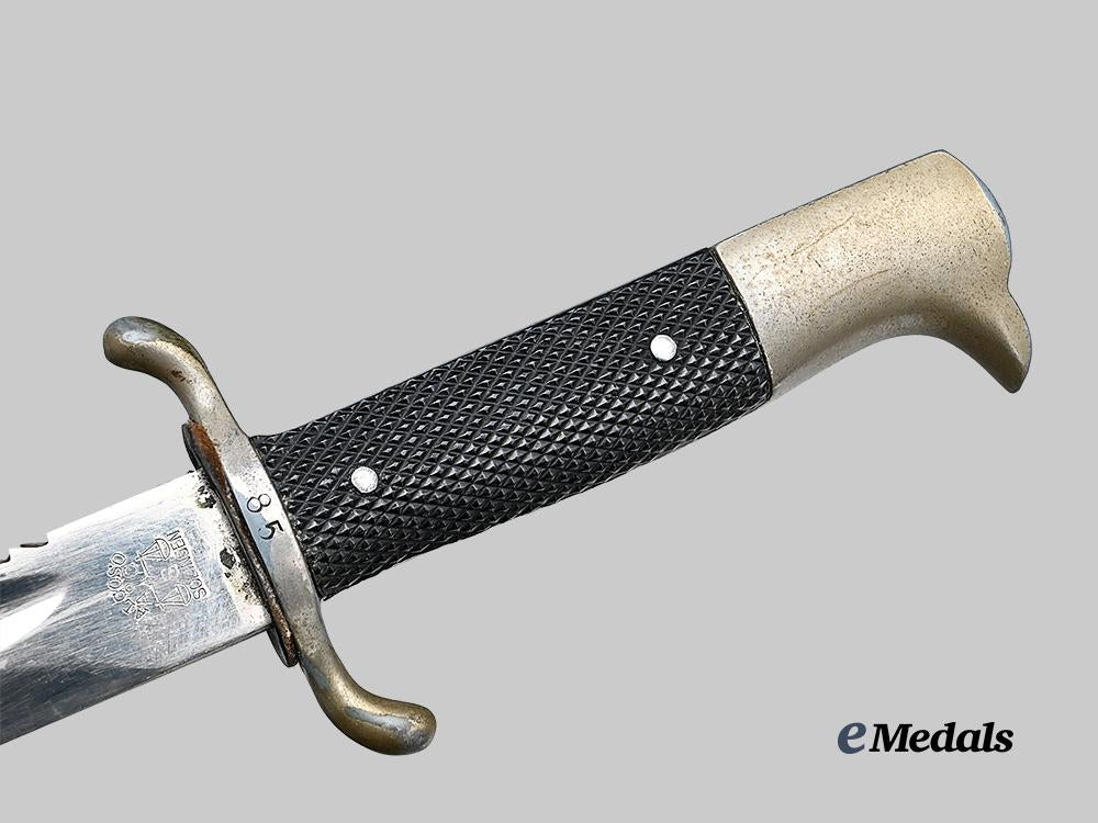germany,_ordnungspolizei._a_fire_police_sawback_dress_bayonet,_by_alcoso_e_medals__g61738_7