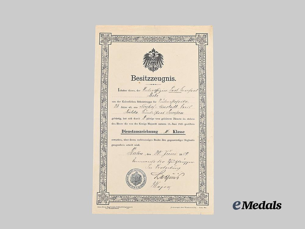germany,_imperial._a_rare_schutztruppe_long_service_award_document_to_unteroffizier_carl_karl_gerhard_belz,_with_medal_e_medals__g61801_3