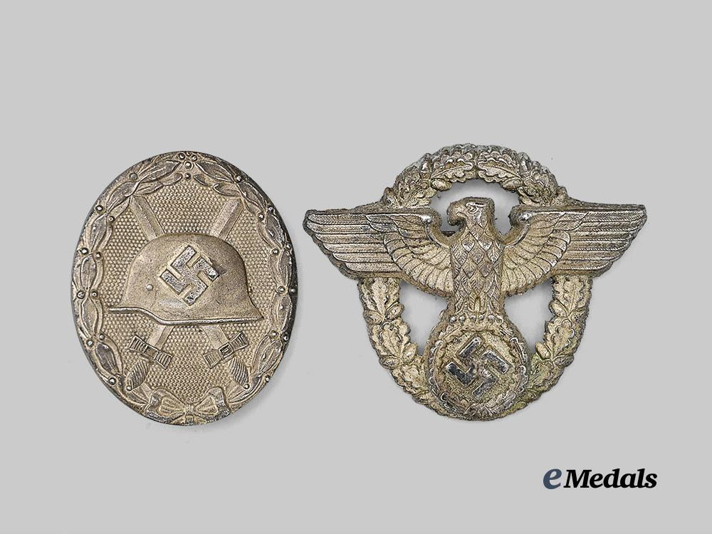 germany,_third_reich._a_pair_of_badges_for_wehrmacht_and_police_service_e_medals__g61883_2