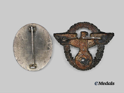 germany,_third_reich._a_pair_of_badges_for_wehrmacht_and_police_service_e_medals__g61883_3