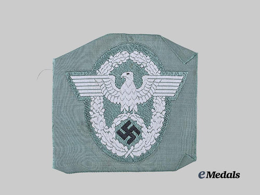 germany,_ordnungspolizei._a_mint_schutzpolizei_sleeve_eagle_for_enlisted_ranks,_be_vo_variant_e_medals__g61970_2