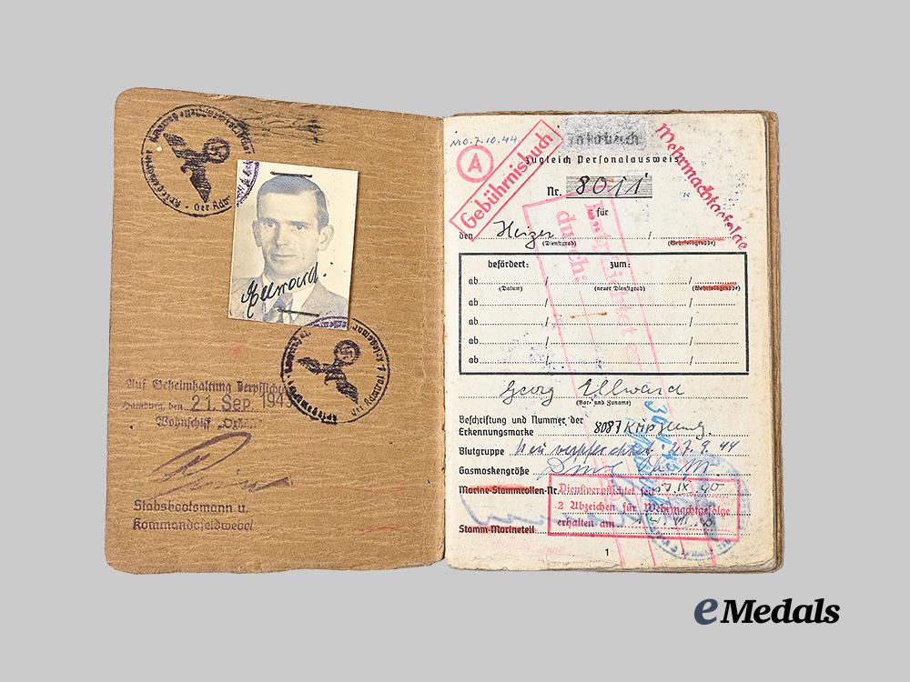 germany,_kriegsmarine._a_gebührnisbuch_to_georg_ellwara,_blockade_runner_badge_recipient_e_medals__g61987_3