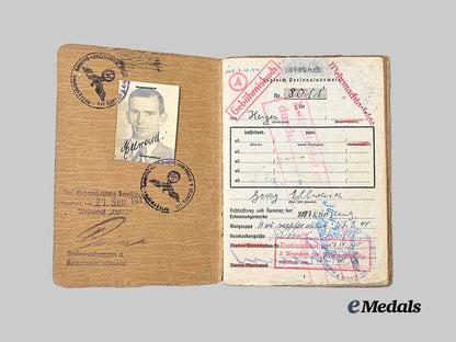 germany,_kriegsmarine._a_gebührnisbuch_to_georg_ellwara,_blockade_runner_badge_recipient_e_medals__g61987_3