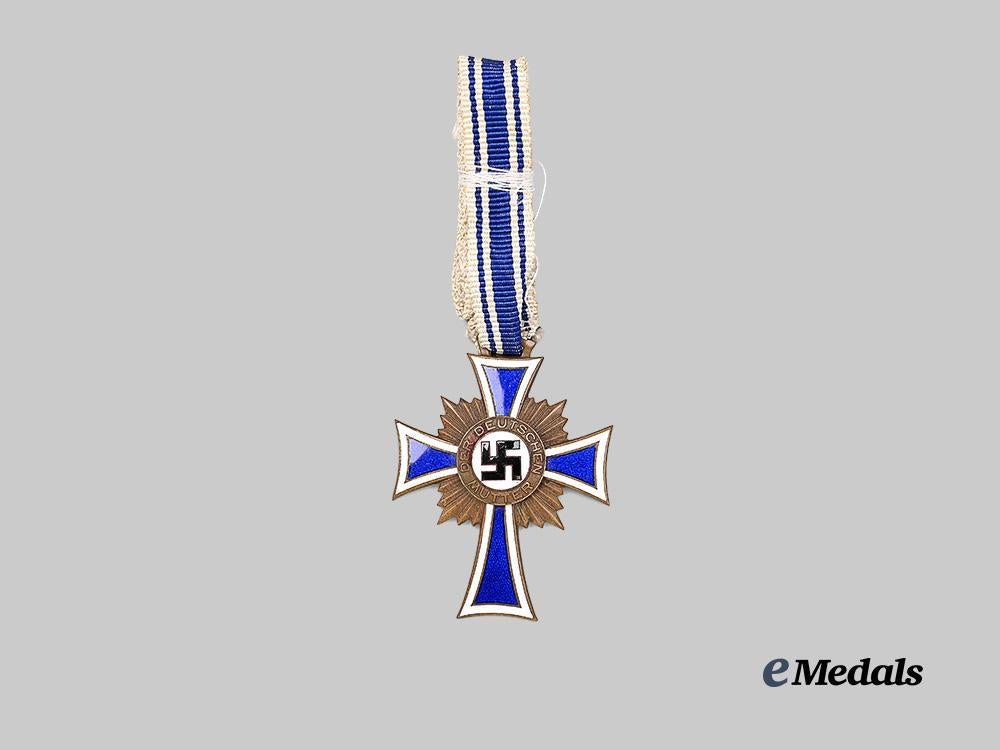 germany,_third_reich._a_rare_honour_cross_of_the_german_mother,_with_a_h_hand-_signed_award_document_e_medals__g61998_7