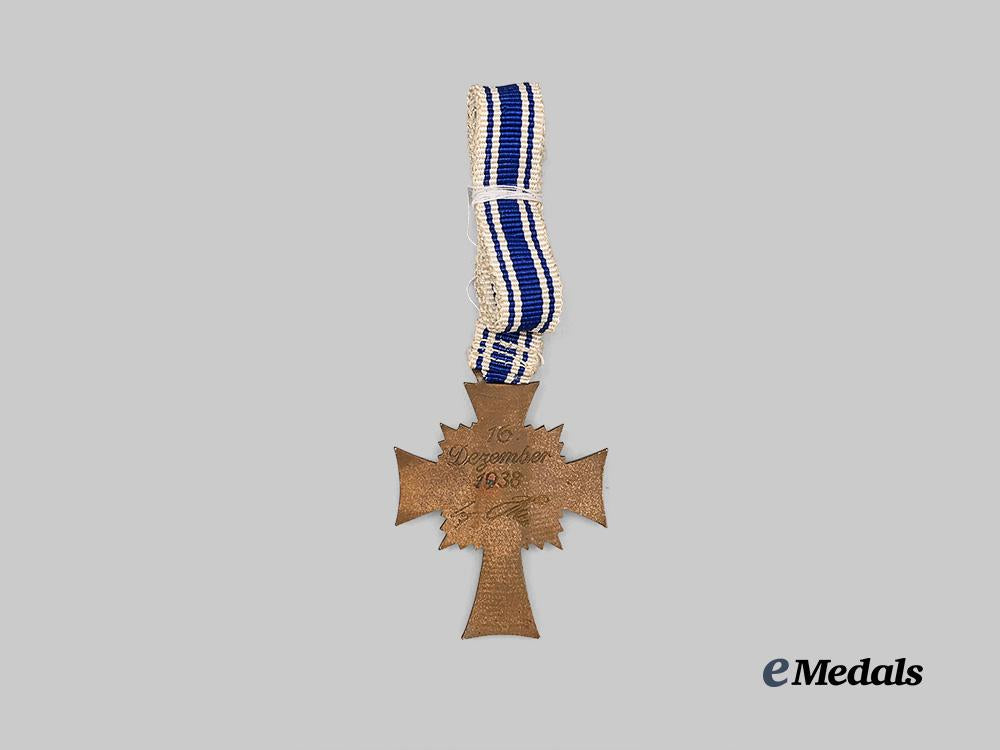 germany,_third_reich._a_rare_honour_cross_of_the_german_mother,_with_a_h_hand-_signed_award_document_e_medals__g61998_9