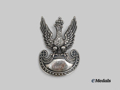 Germany, Wehrmacht. A Polish Army Cap Badge with 1939 German Campaign Dedication