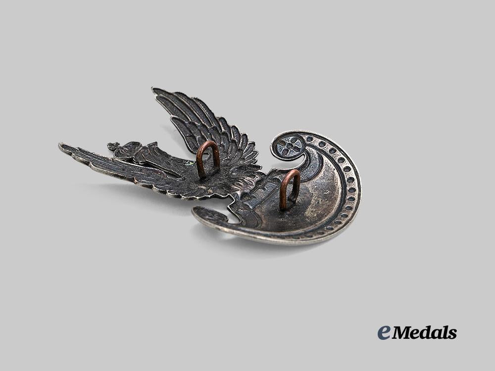 germany,_wehrmacht._a_polish_army_cap_badge_with1939_german_campaign_dedication_e_medals__g62188_4