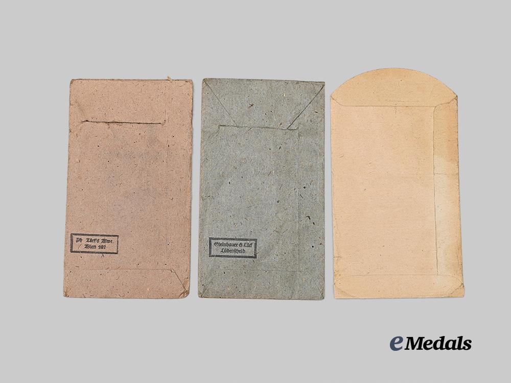 germany,_wehrmacht._a_mixed_lot_of_issue_packages_for_combatant_awards_e_medals__g62452_3