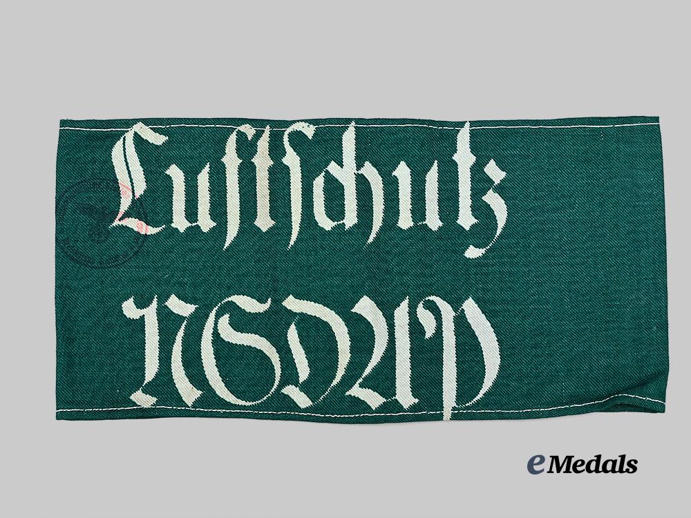 germany,_n_s_d_a_p._an_armband_for_a_party_member_in_luftschutz_service_e_medals__g62457_2