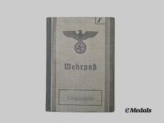Germany, Kriegsmarine. A Wehrpaß to Friedrich Krätzer, Conscript, with Identification Tag