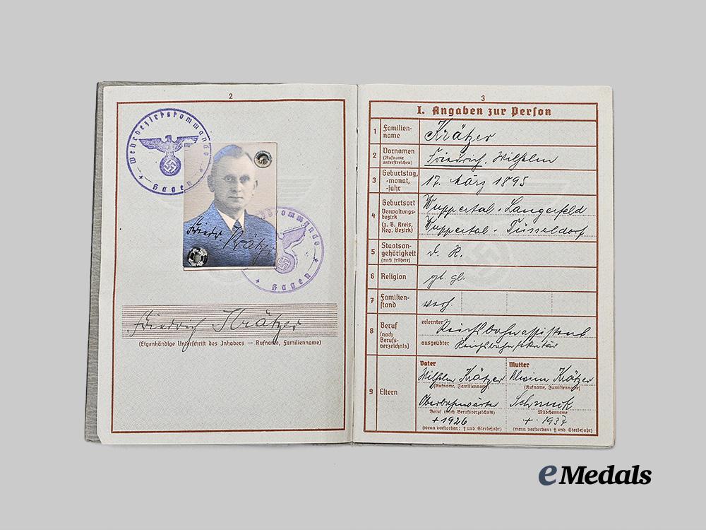 germany,_kriegsmarine._a_wehrpaß_to_friedrich_krätzer,_conscript,_with_identification_tag_e_medals__g62486_3