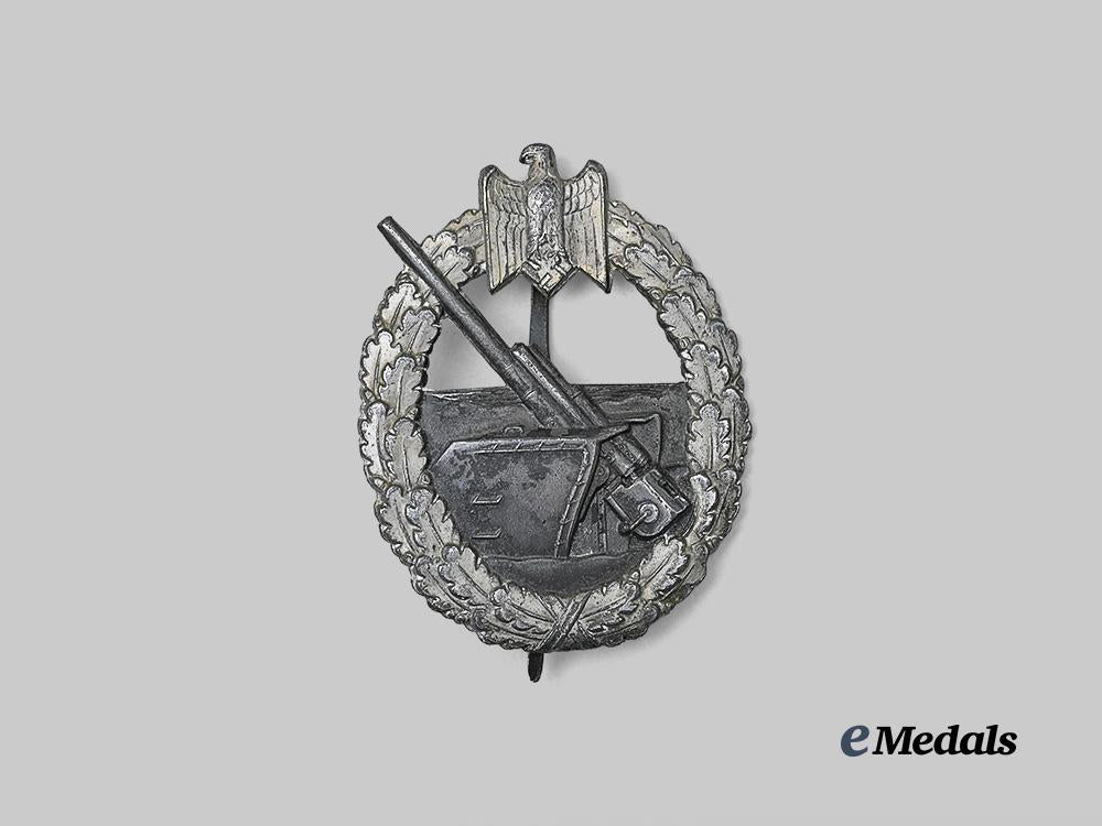 germany,_kriegsmarine._a_coastal_artillery_war_badge,_by_schwerin_e_medals__g62496_2