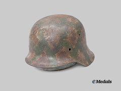 Germany, Heer. An M42 Stahlhelm, with Field Camouflage, by Sächsische Emaillier- und Stanzwerke