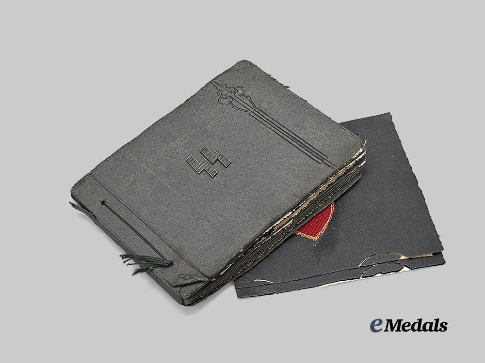 germany,_s_s._a_rare_latvian_legion_wartime_photo_album_to_s_s-_oberschütze_alberts_jansons,_with_sleeve_shield_and_award_document_e_medals__g62516_2