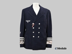 Germany, Kriegsmarine. A Naval Administration Dark Blue Service Jacket for Elevated Ranks