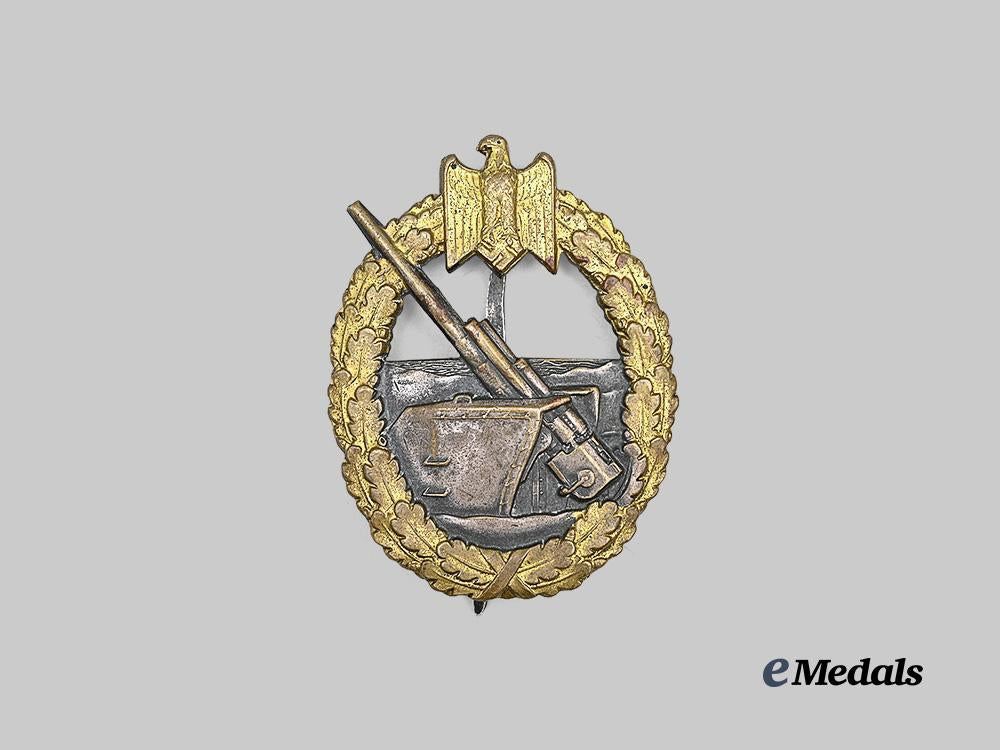 germany,_kriegsmarine._a_coastal_artillery_war_badge,_variation1,_by_schwerin_e_medals__g63160_2
