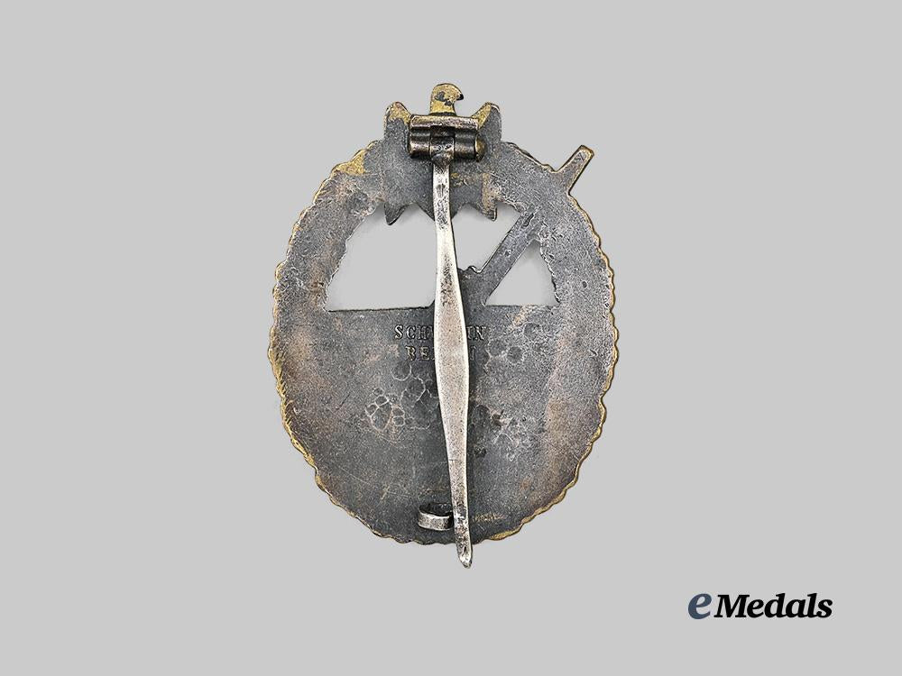 germany,_kriegsmarine._a_coastal_artillery_war_badge,_variation1,_by_schwerin_e_medals__g63160_3